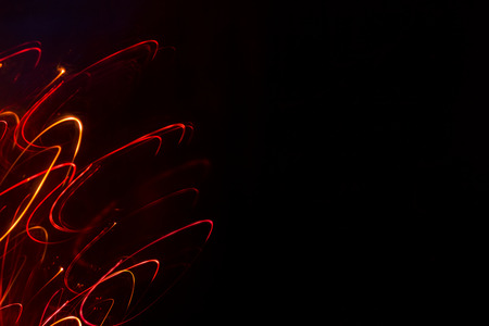 an image of bright sparks on colorful background with bokeh effect