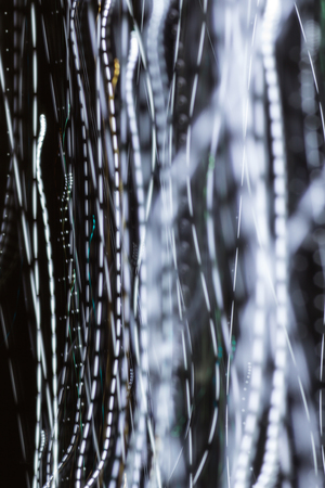 an image of bright sparks on colorful background with bokeh effectの写真素材