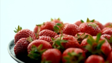 Fresh, ripe, juicy strawberries. Appetizing berries with droplets on a trayの写真素材