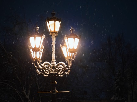Night Winter Street Lamp With Falling Snow. Lanterns in evening park. Beautiful snowfall for...