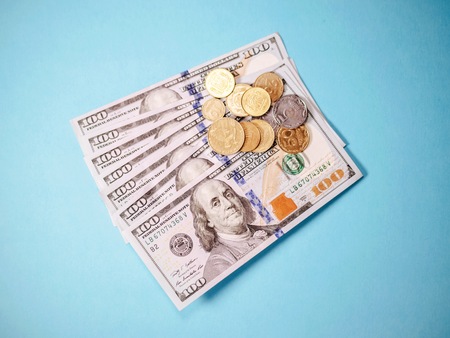 Close up of Various currency notes and coins from different countriesの写真素材