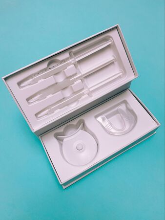 Bleaching set with box on blueの写真素材