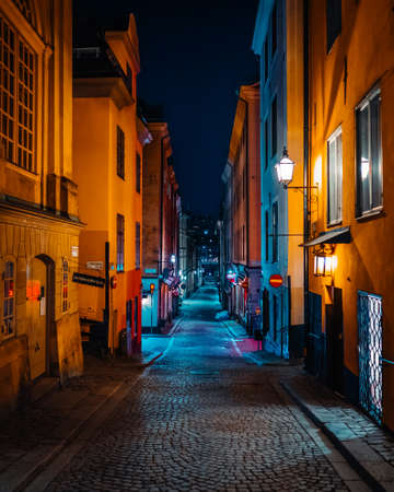 Beautiful cozy night narrow street in Gamla Stan - old town of Stockholm. 14 February 2020,...
