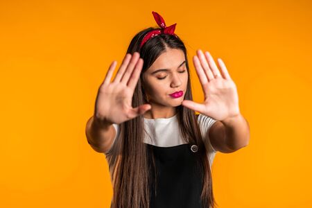 No, never, pretty brunette woman disliking and rejecting gesture by stop signの写真素材