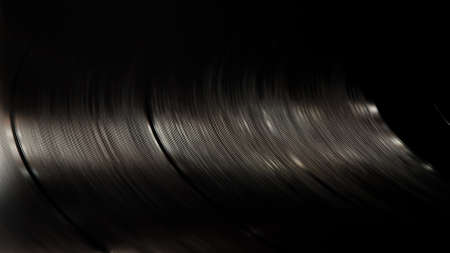 Retro-styled spinning record vinyl player. Close up. Rotating vintage phonograph close up. Beautiful colorful movie.の写真素材