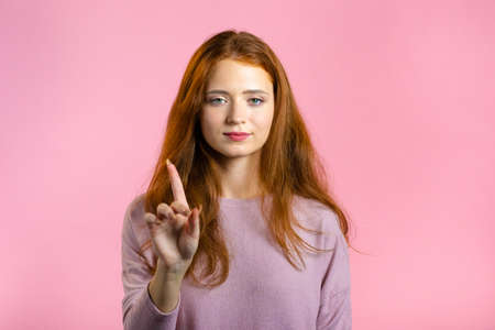 Woman disapproving with No finger Sign Make Negation Finger Gesture. Attention, Denying, Rejecting,...