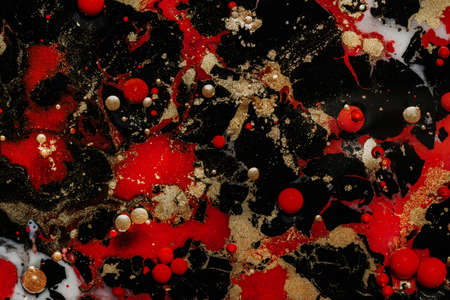 Abstract marble liquid glitter paint. Bubbles. Dark, white and red pearl inks in oil. Colorful shapes. Detailed background, amazing design, swirlingの写真素材