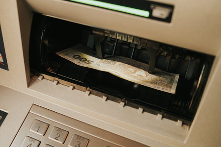 Withdrawal of Czech crowns in cash from ATM, money transactionsの写真素材