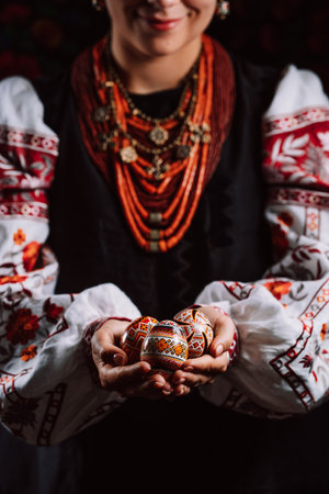Ukrainian woman hand painted Easter eggs. Geometric slavic decoration ornamentsの写真素材