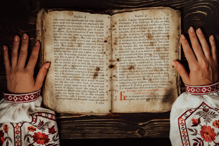 March 2023 - Kyiv, Ukraine. Woman reading ancient book - Bible.Psalter,19thのeditorial素材