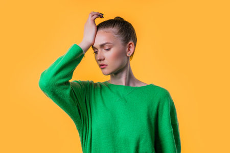 Worried confused woman, no, she forgot.Girl feeling sorrow,regret,drama, failureの写真素材