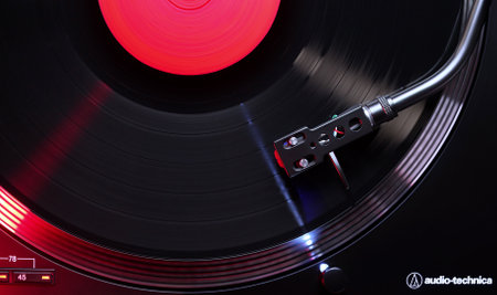 February 2024 - Prague, Czechia. Audio technica spinning, vinyl record grooves