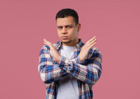 No,never, african american man rejecting gesture stop crossing hands.Ban,timeoutの写真素材