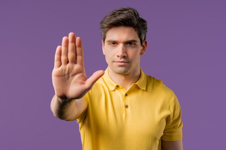 Serious Man Showing Rejecting Gesture By Stop Palm Sign. Not Allow, Prohibitionの写真素材
