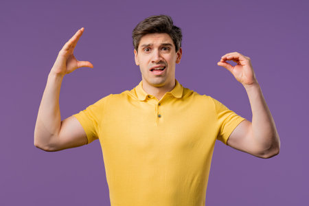 Irritated mature handsome man showing gesture with hands, rolling eyesの写真素材