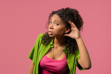 Curious African Woman Doesnt Hear, Asking What. Quiet Sound, Misunderstandの写真素材