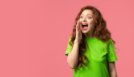 Happy woman announce, shouting, holding hand near open mouth. Attention,Hurry upの写真素材