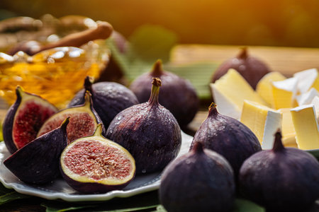 Cheese Platter With Camembert Brie, Healthy Juicy Organic Figs, Honey And Grapes