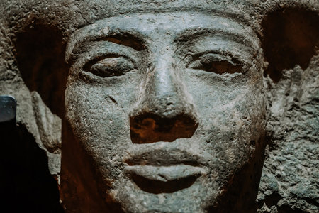 Close-Up View Of Detailed Ancient Egyptian Sarcophagus Head, Showcasing Carvingsの写真素材