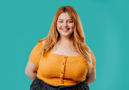 Charming Plus Size Woman, Natural Authentic Beauty On Blue. Overweight Ladyの写真素材