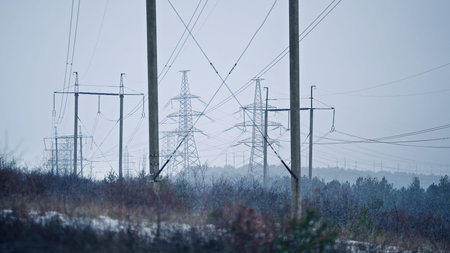 High voltage substation. Steel power transmission pylons