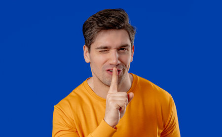Handsome Man With Gesture Of Shhh, Secret, Silence, Conspiracy, Quiet, Rumors
