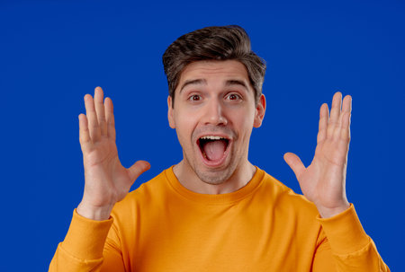 Amazed Man Shocked, Wow. Handsome Mature Guy Surprised On Blue, Unbelievable