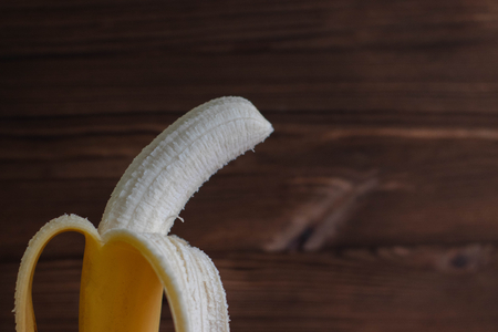 Banana on the wooden background. Top view.の写真素材