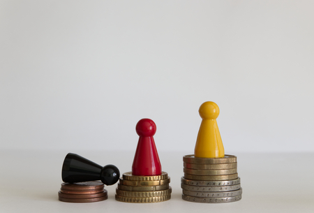 Coins stacks with figure yellow red blackの写真素材