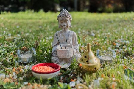 Buddha statue isolated on the fieldの写真素材