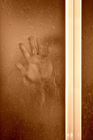 young man in shower bathの写真素材