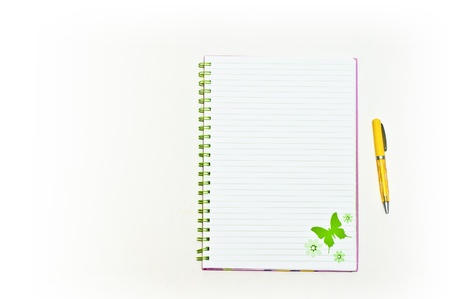 white notepad and pen on table