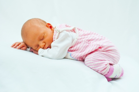 little baby are sleeping in bedの写真素材