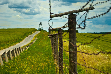 old border with barbed wireの写真素材
