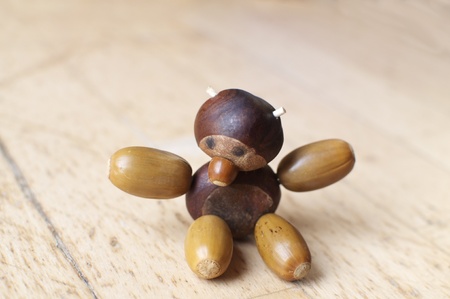 Small figurines made from chestnuts, hazelnuts and acornの写真素材