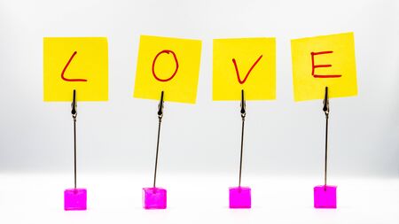 Sign of LOVE on yellow stickers.