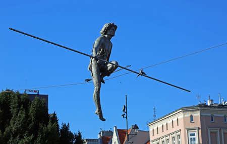 Tightrope Walker on blue sky - Bydgoszcz, Polandのeditorial素材