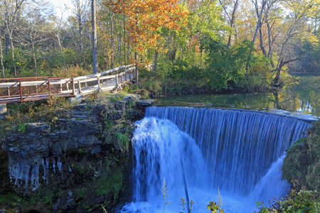Cedar Cliff Falls in autumn foliage - Indian Mound Reserve - Ohioの写真素材