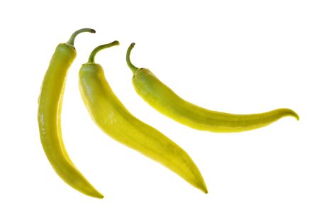 fresh yellowish peppers with water dropsの写真素材