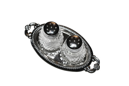 two salt shakers isolated on white backgroundの写真素材