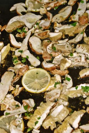 baked mushrooms with lemonの写真素材