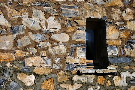 brick wall - two windows in an old brick wallの写真素材