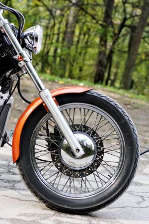 motorcycle on a road in the forestの写真素材
