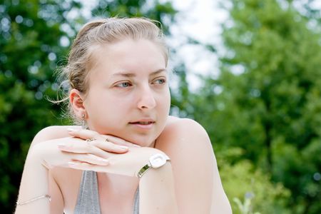 beautiful blond girl posing in the natureの写真素材