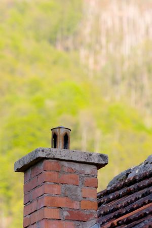 chimney on a roof, in the natureの写真素材