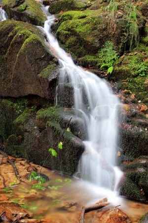 River flow and small waterfallの写真素材