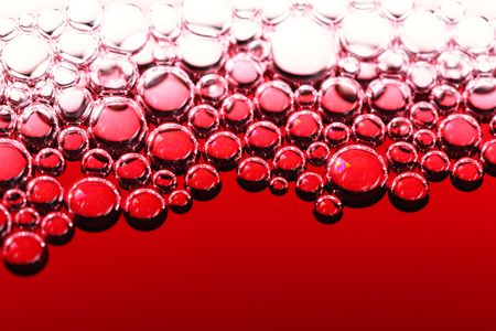 abstract red wine bubbles, close up shotの写真素材