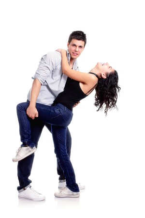 young couple dancing pose, isolated on whiteの写真素材