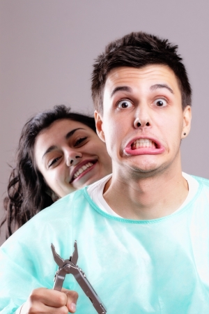 portrait of a dentist and a female patientの写真素材