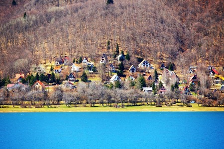 view of a settlement next to the Mavrovo Lake in Macedoniaの写真素材